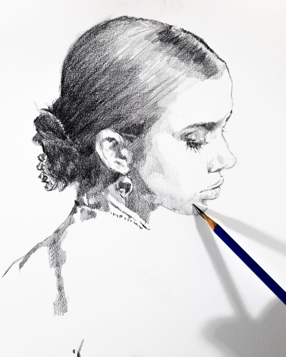 A hand-drawn portrait of a loved one by Andros Karr